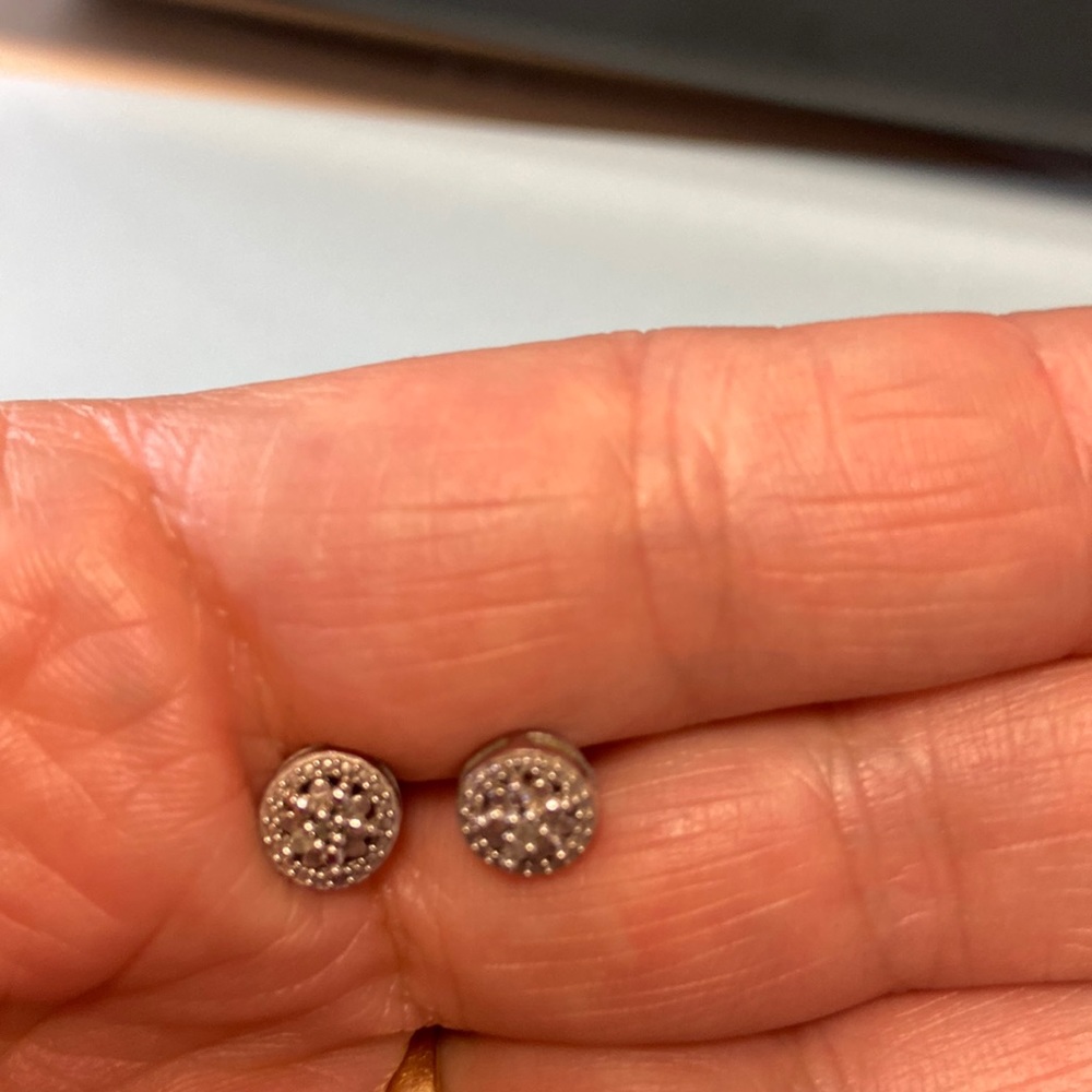 Silver stud earrings with some delicate detailing